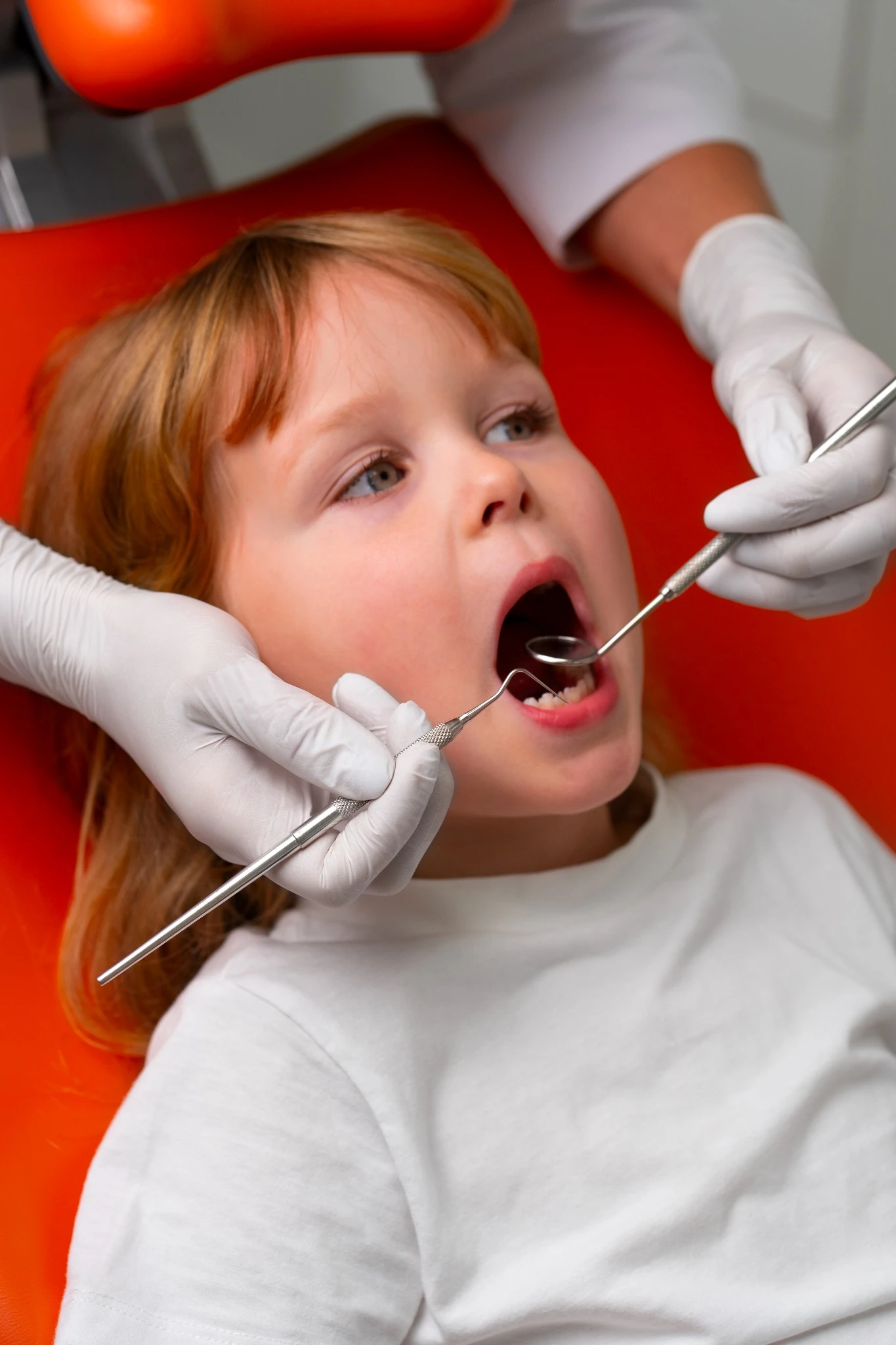 Young child receiving dental checkup at pediatric dentist in Fresno